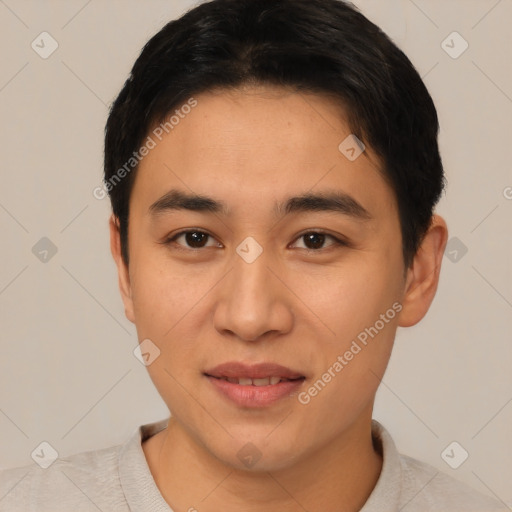 Joyful asian young-adult male with short  brown hair and brown eyes