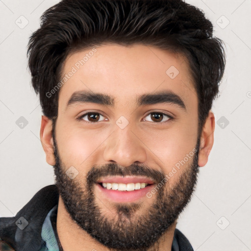 Joyful white young-adult male with short  black hair and brown eyes