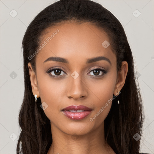 Joyful latino young-adult female with long  brown hair and brown eyes