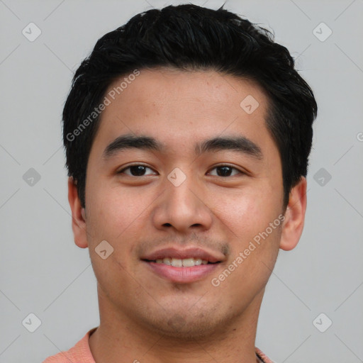 Joyful asian young-adult male with short  black hair and brown eyes