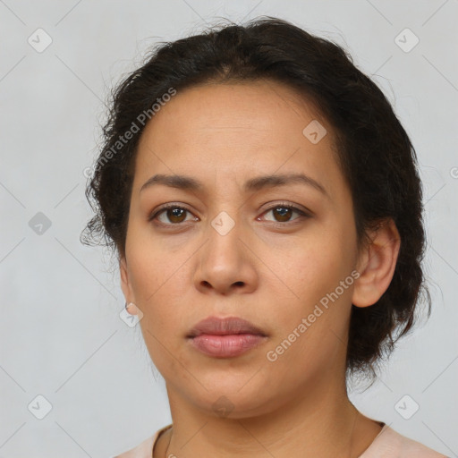 Neutral latino adult female with short  brown hair and brown eyes