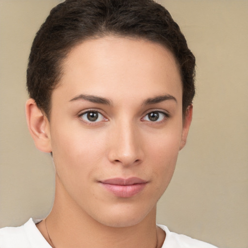 Neutral white young-adult female with short  brown hair and brown eyes