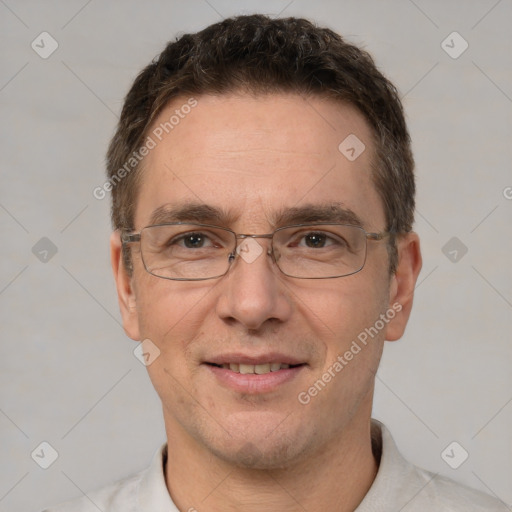 Joyful white adult male with short  brown hair and brown eyes