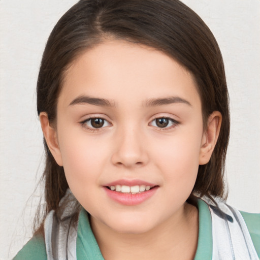 Joyful white child female with medium  brown hair and brown eyes