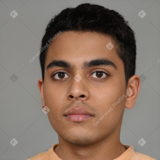 Neutral latino young-adult male with short  black hair and brown eyes