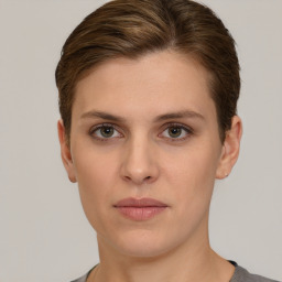 Neutral white young-adult female with short  brown hair and grey eyes