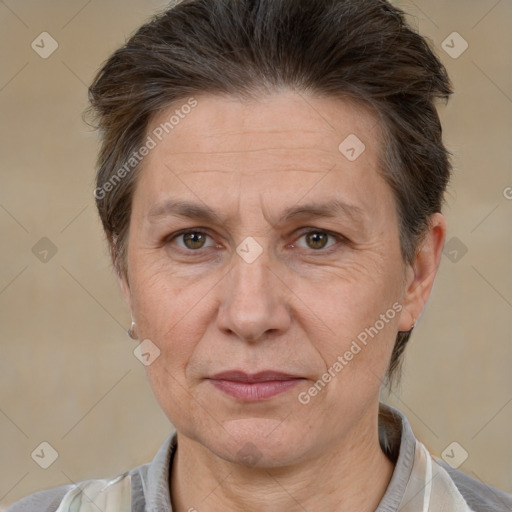 Joyful white adult female with short  brown hair and brown eyes