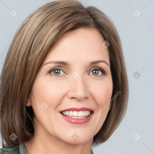 Joyful white young-adult female with medium  brown hair and grey eyes