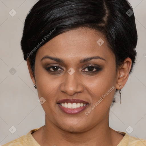 Joyful latino young-adult female with short  brown hair and brown eyes