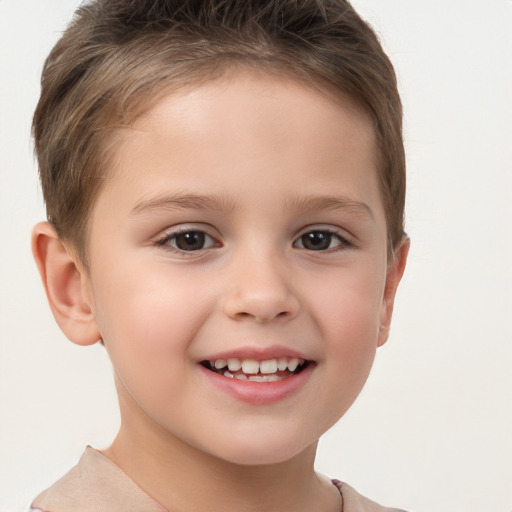 Joyful white child female with short  brown hair and brown eyes