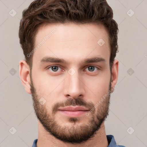 Neutral white young-adult male with short  brown hair and grey eyes