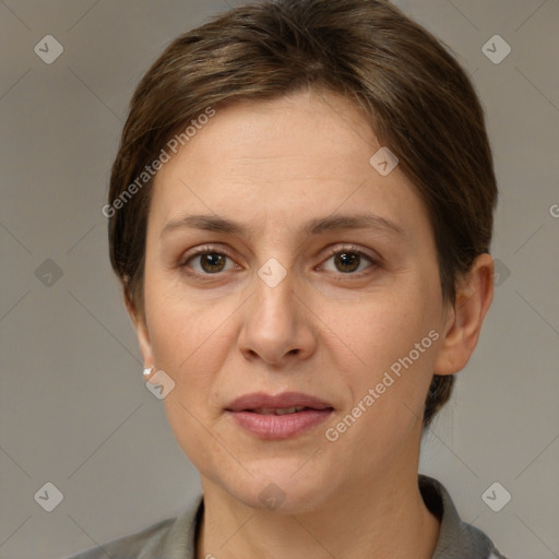 Joyful white adult female with short  brown hair and brown eyes