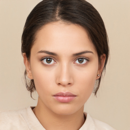 Neutral white young-adult female with medium  brown hair and brown eyes