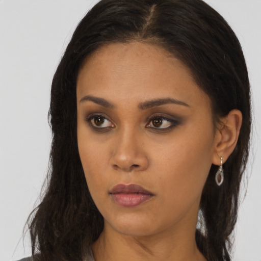 Neutral asian young-adult female with long  brown hair and brown eyes