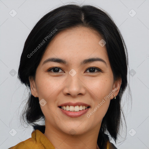 Joyful asian young-adult female with medium  black hair and brown eyes