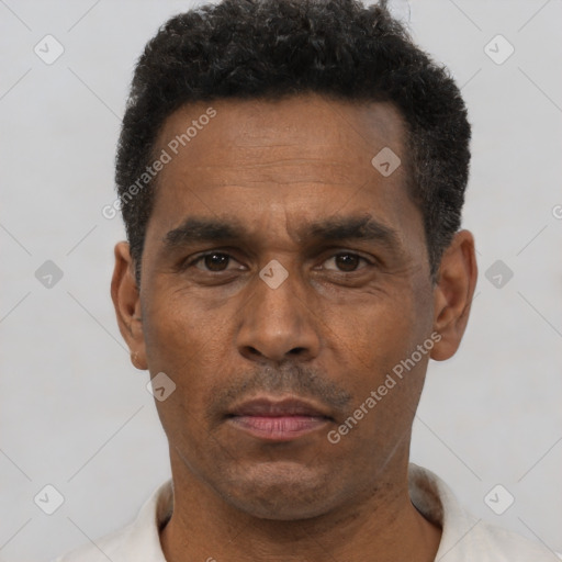 Neutral black adult male with short  black hair and brown eyes