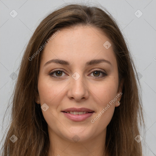 Joyful white young-adult female with long  brown hair and grey eyes