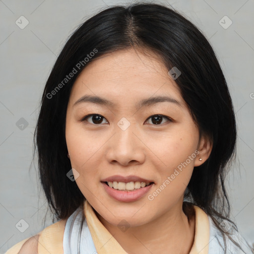 Joyful asian young-adult female with medium  black hair and brown eyes