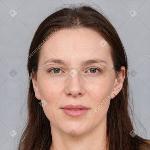 Joyful white adult female with long  brown hair and grey eyes