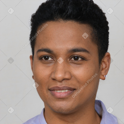 Joyful black young-adult male with short  brown hair and brown eyes