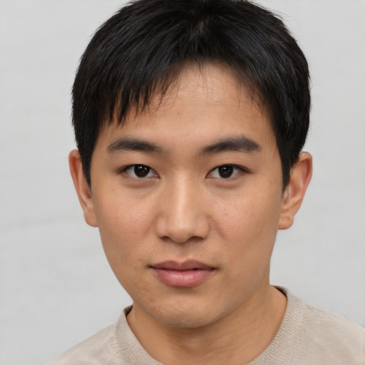 Neutral asian young-adult male with short  brown hair and brown eyes