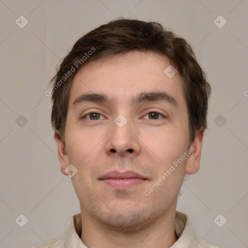 Neutral white young-adult male with short  brown hair and brown eyes