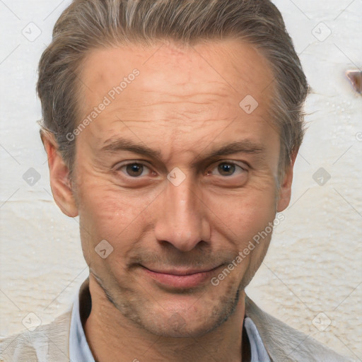 Joyful white adult male with short  brown hair and brown eyes