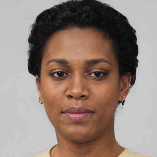 Neutral black young-adult female with short  black hair and brown eyes