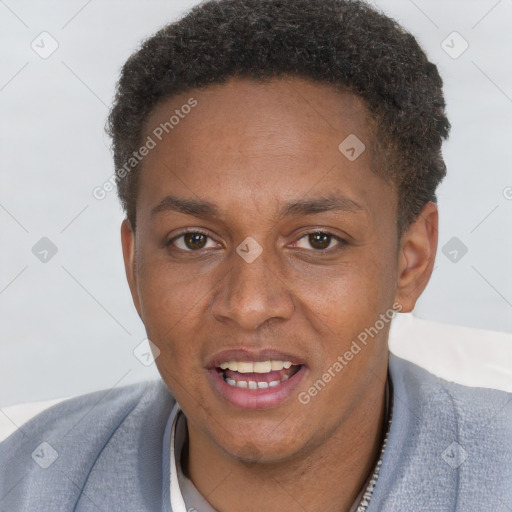 Joyful black young-adult male with short  brown hair and brown eyes