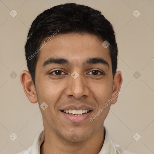 Joyful white young-adult male with short  black hair and brown eyes