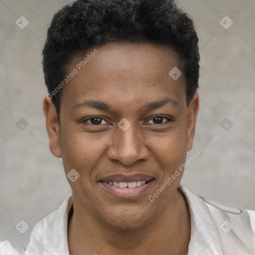 Joyful black young-adult female with short  brown hair and brown eyes