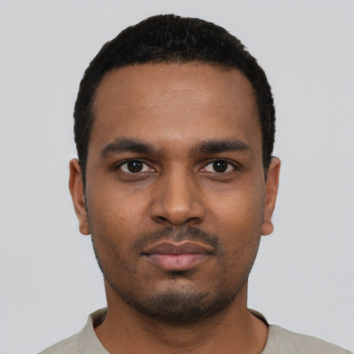 Neutral black young-adult male with short  black hair and brown eyes