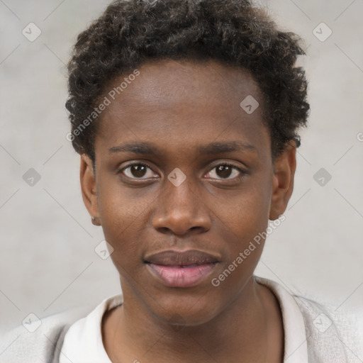 Joyful black young-adult male with short  brown hair and brown eyes