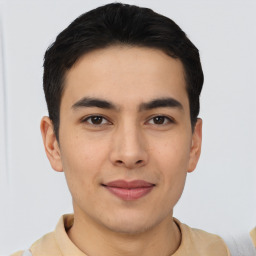 Joyful asian young-adult male with short  black hair and brown eyes