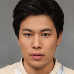 Neutral asian young-adult male with short  brown hair and brown eyes