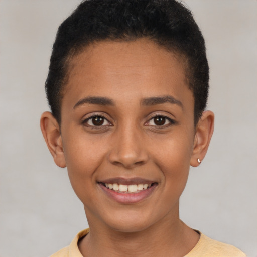 Joyful latino young-adult female with short  brown hair and brown eyes