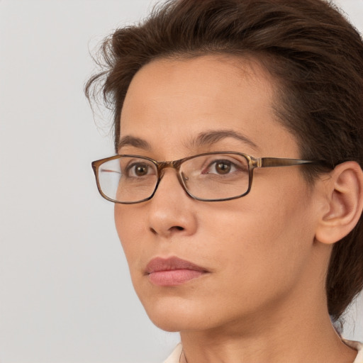 Neutral white adult female with medium  brown hair and brown eyes