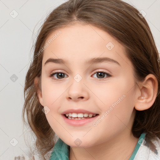 Joyful white child female with medium  brown hair and brown eyes