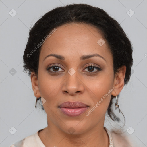 Joyful black young-adult female with medium  brown hair and brown eyes