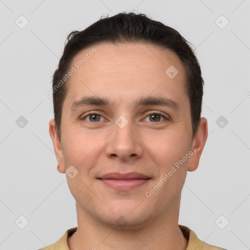 Joyful white young-adult male with short  brown hair and brown eyes