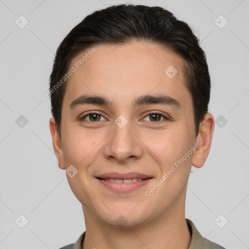 Joyful white young-adult male with short  brown hair and brown eyes