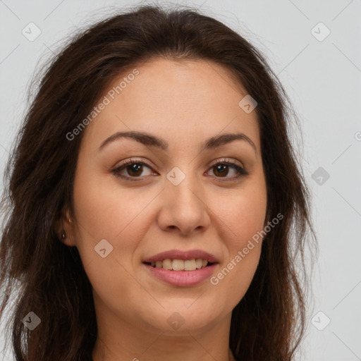 Joyful white young-adult female with long  brown hair and brown eyes