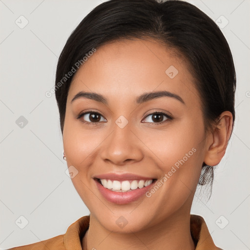 Joyful white young-adult female with long  brown hair and brown eyes