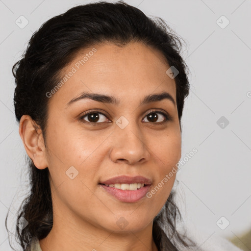 Joyful latino young-adult female with medium  brown hair and brown eyes