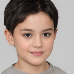 Joyful white child female with short  brown hair and brown eyes