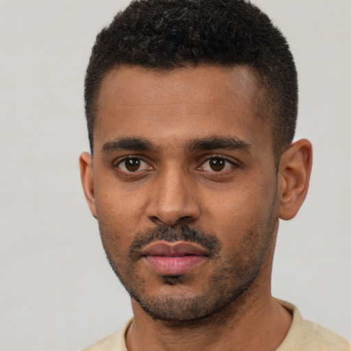 Neutral black young-adult male with short  black hair and brown eyes