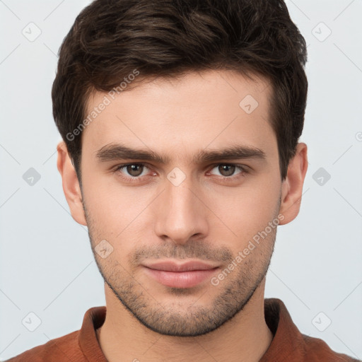 Neutral white young-adult male with short  brown hair and brown eyes