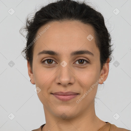 Joyful latino young-adult female with short  brown hair and brown eyes