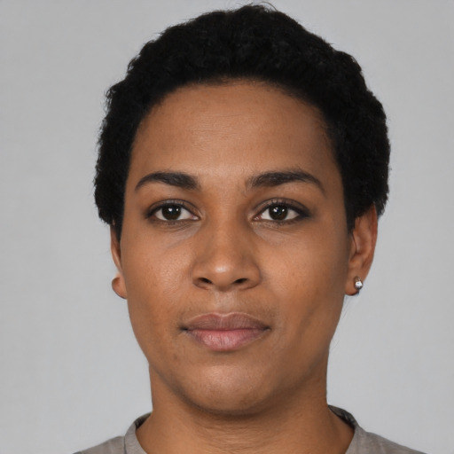 Neutral latino young-adult female with short  black hair and brown eyes