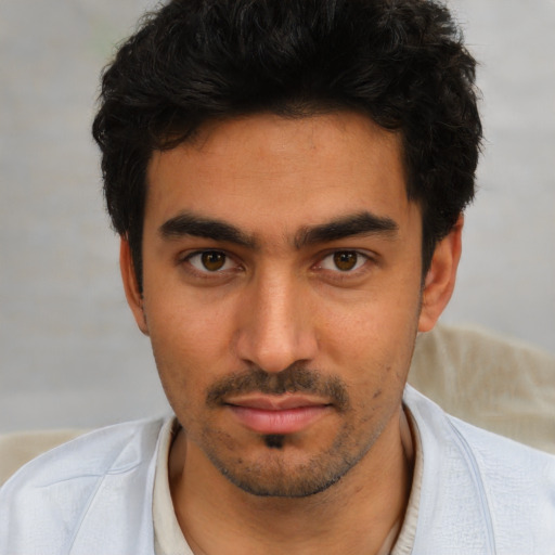 Neutral white young-adult male with short  black hair and brown eyes